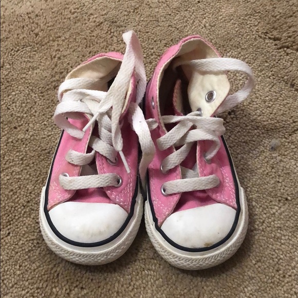 kids pink high top converse